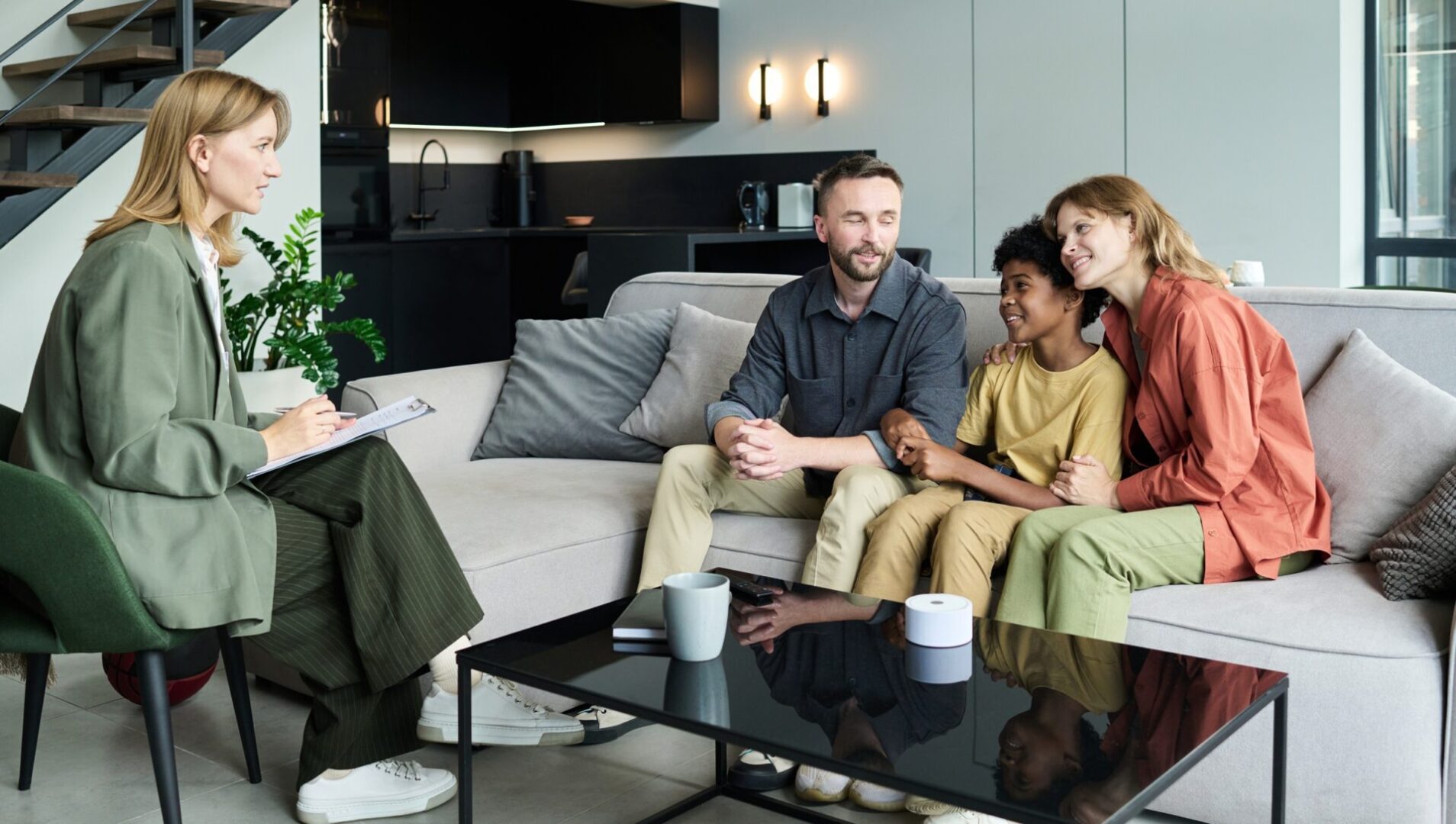 Family having a counseling session at home.